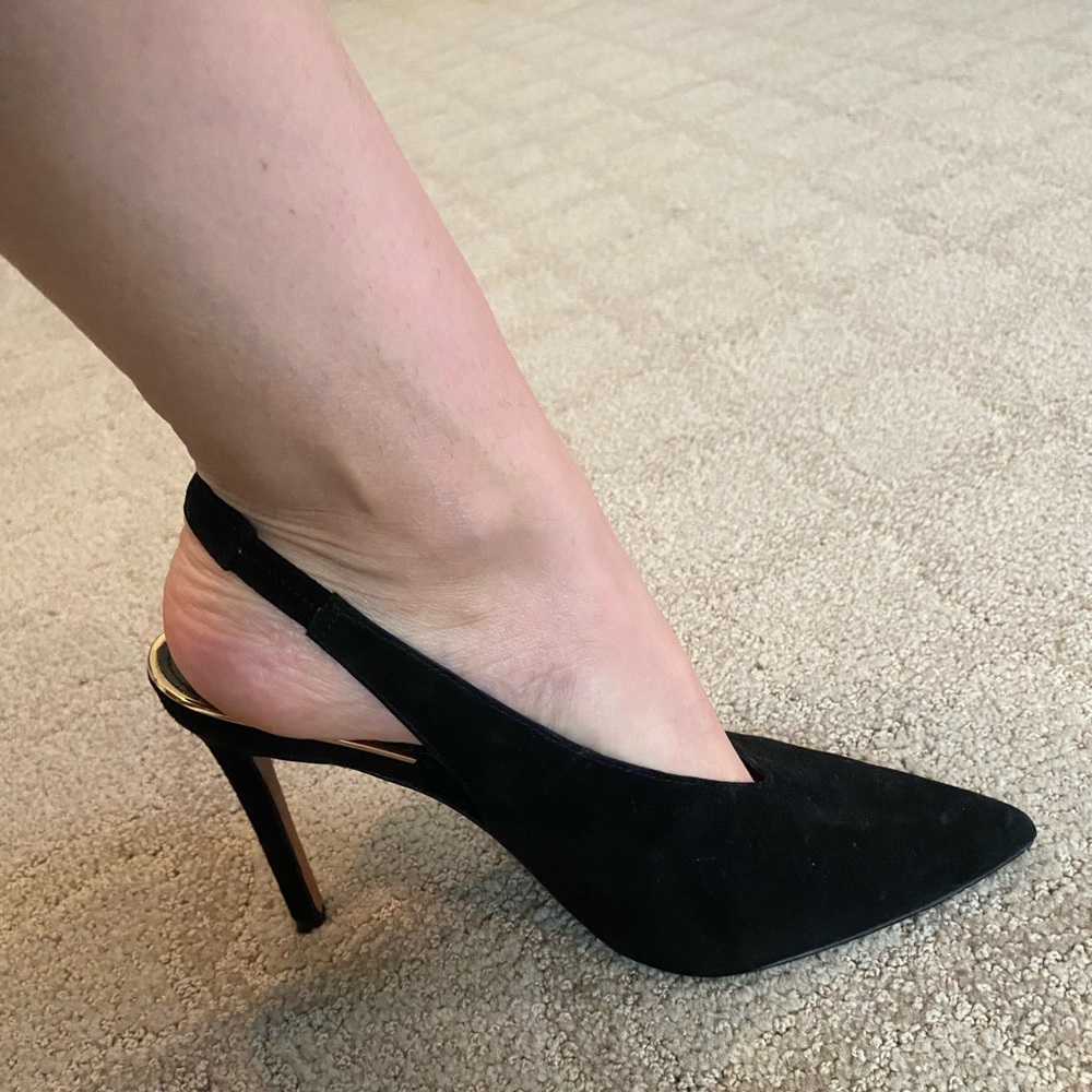 A classic staple. BCBG Maxazria black suede heel in size 9